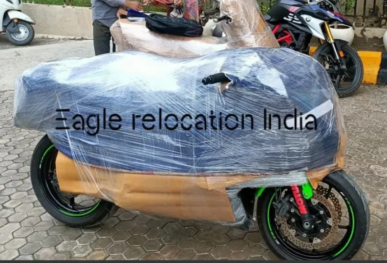 a kawasaki bike is packed for bike relocation {transportation} in panipat